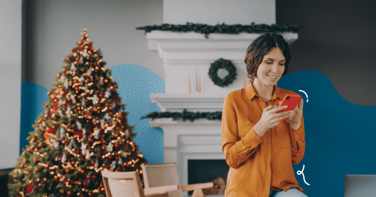 woman texting in living room - How to Write Targeted Holiday SMS Messages